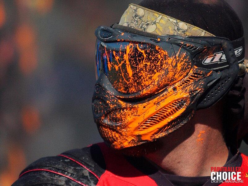 paintball player with splattered mask