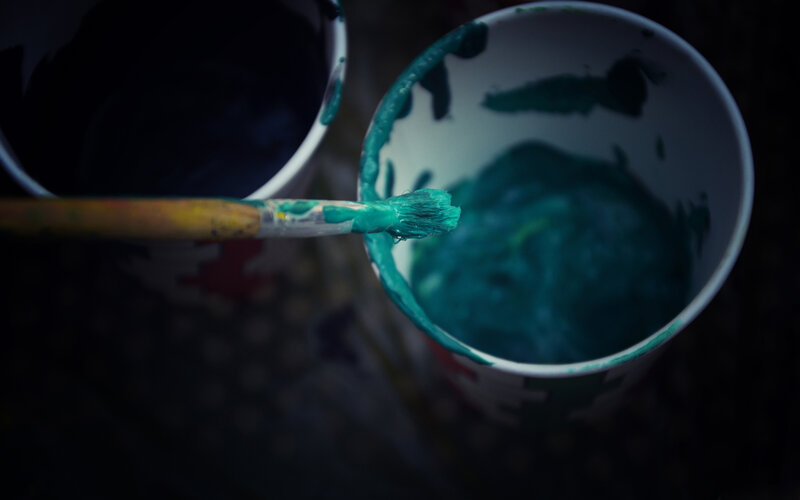 Paintbrush in Paint Cup