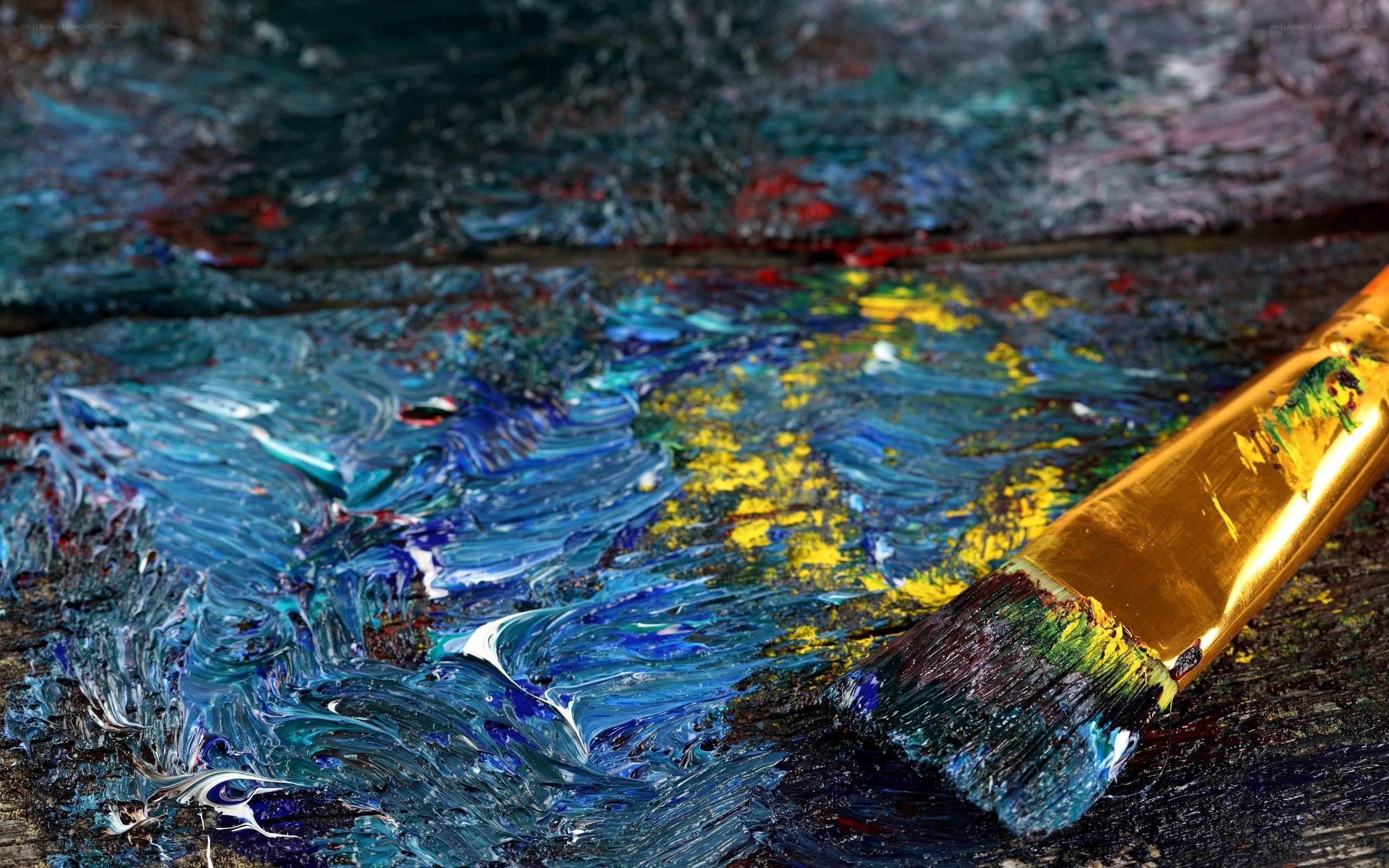 Paintbrush on a painter's palette