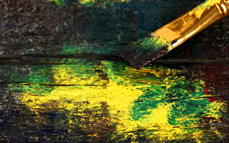 Paintbrush on Wooden Surface