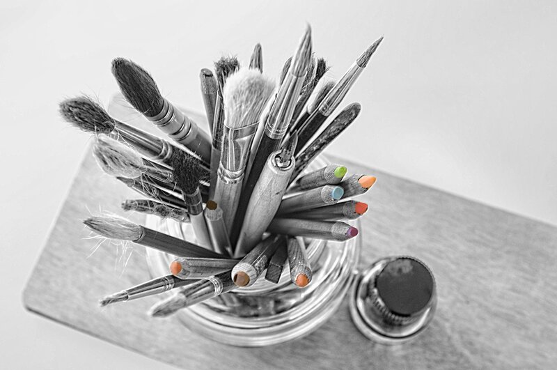 Paintbrushes and Colored Pencils