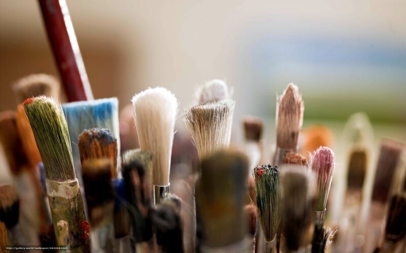 paintbrushes in a holder