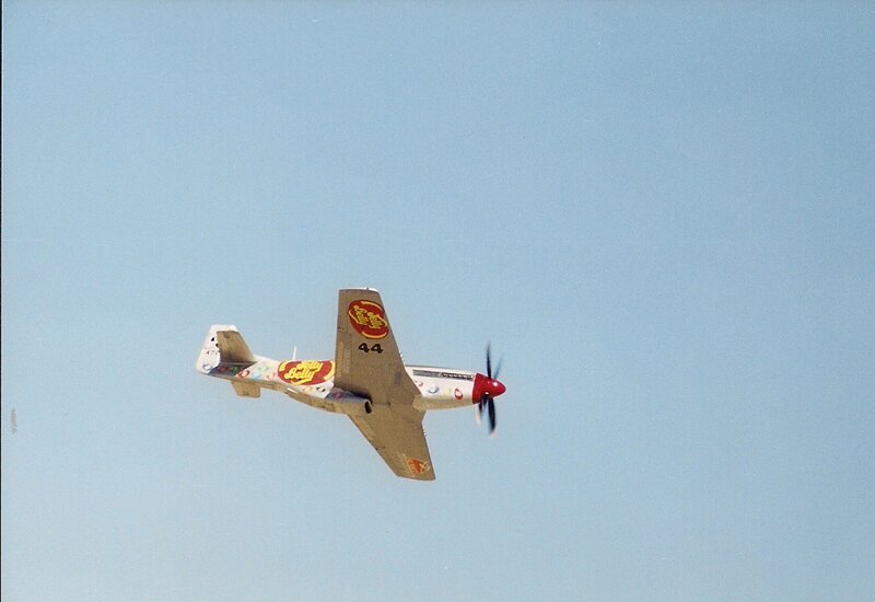 Painted Airplane in Flight — Blue