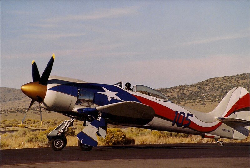 Painted Airplane on Runway — Blue
