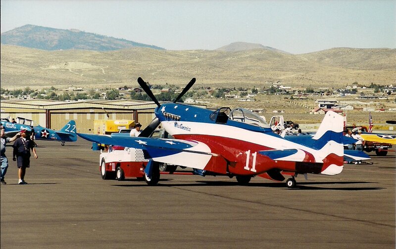 Painted Airplane on Tarmac — Red