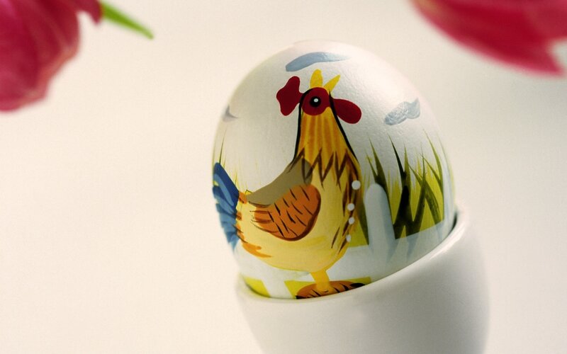 Painted egg with rooster design
