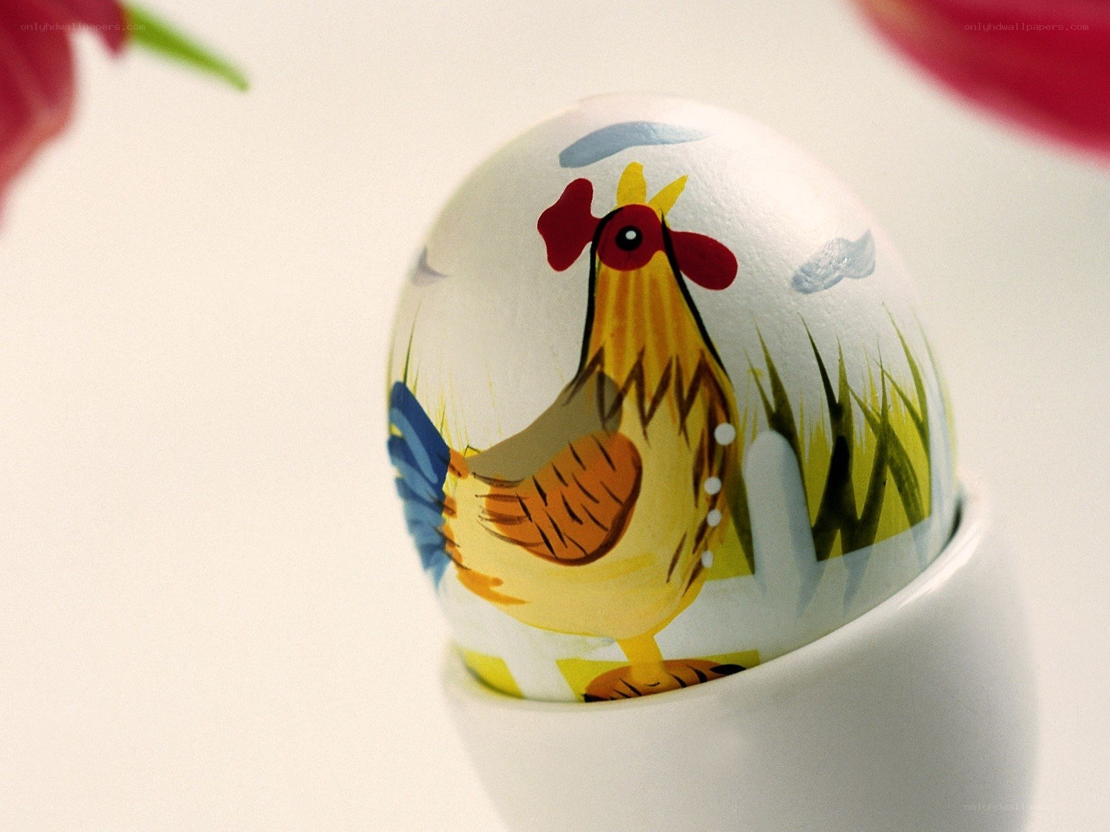 Painted egg with rooster design