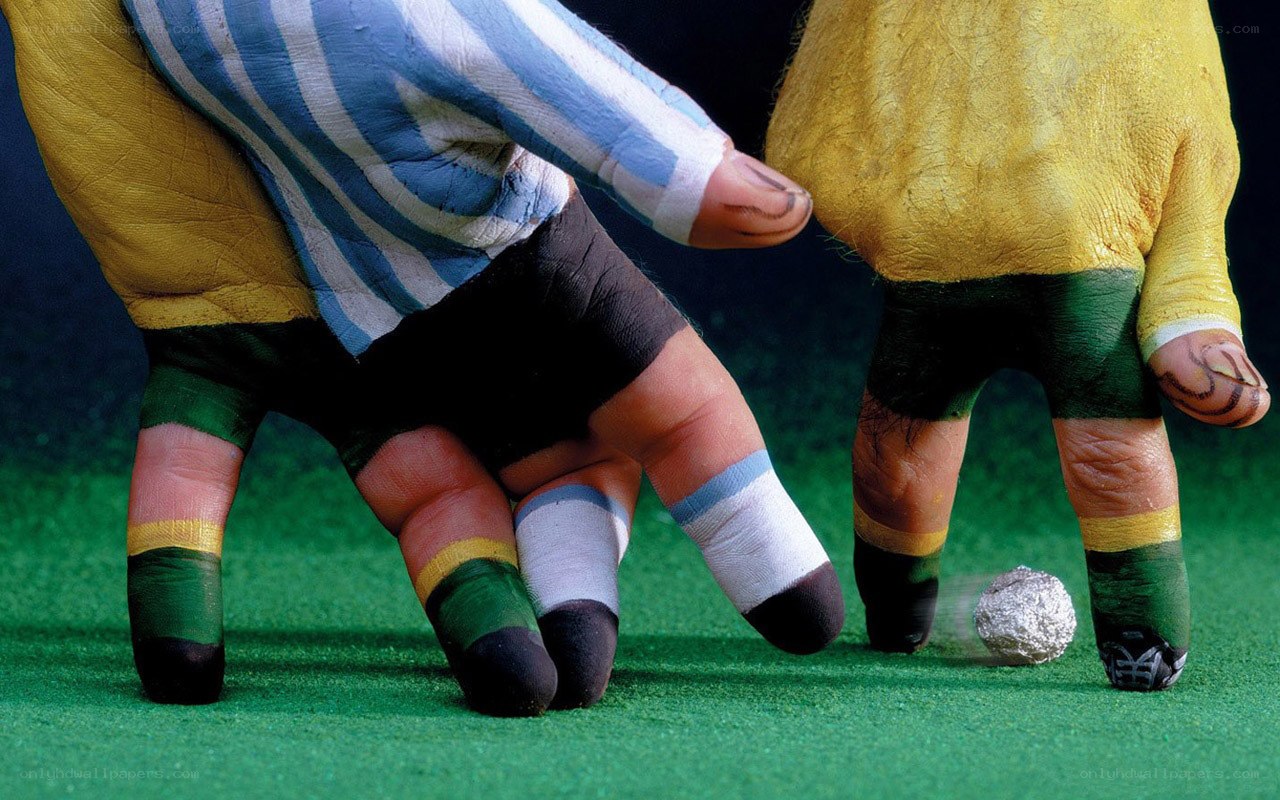 Painted hands as soccer players
