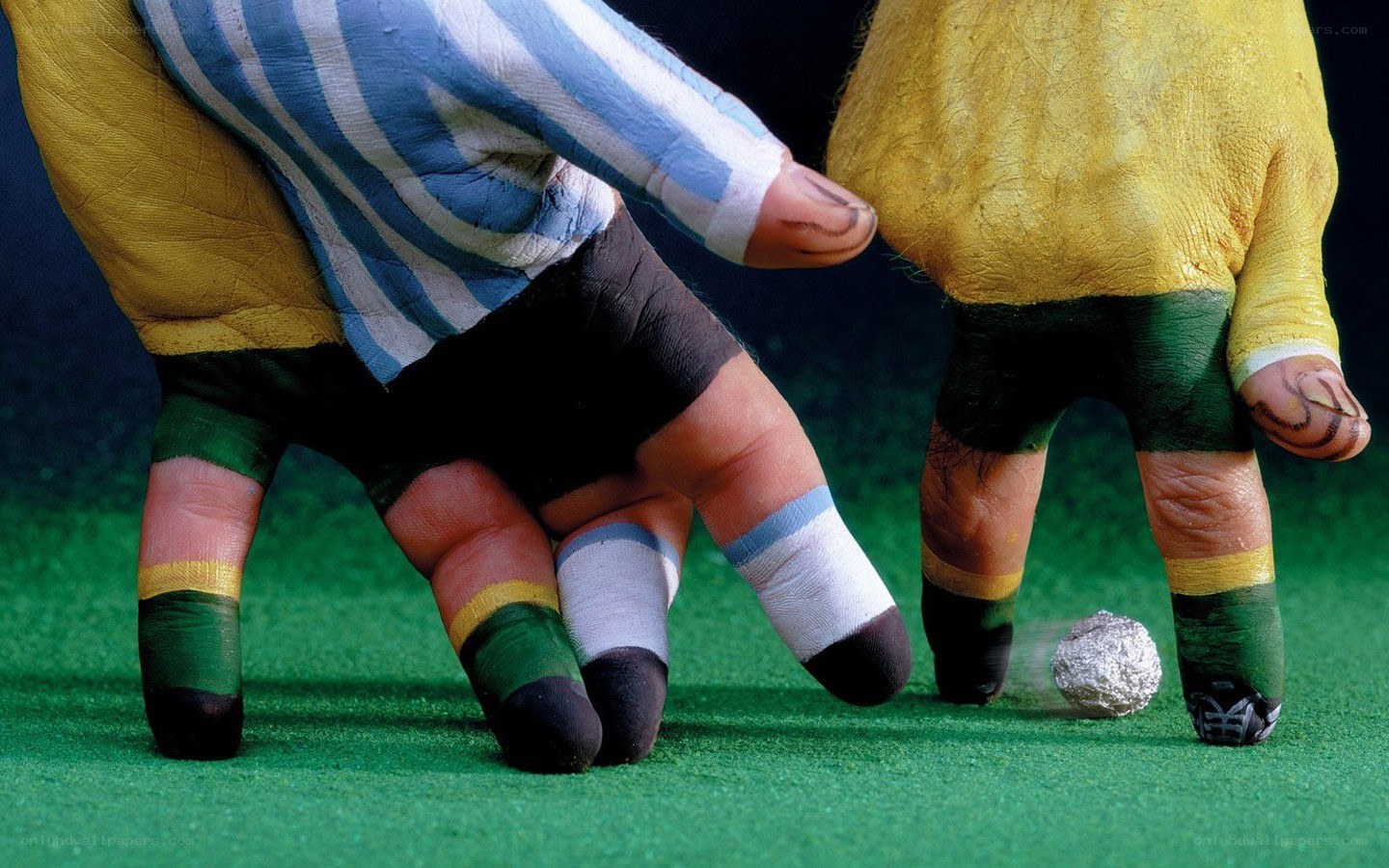 Painted hands as soccer players