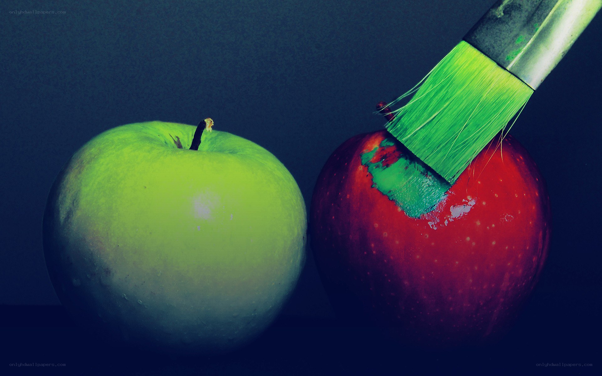 painting an apple red