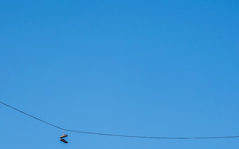 Pair of Shoes on Wire