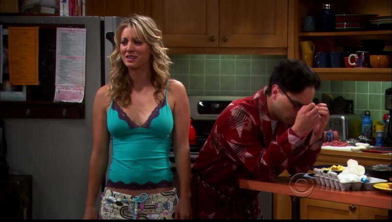 Pajama-clad couple in kitchen
