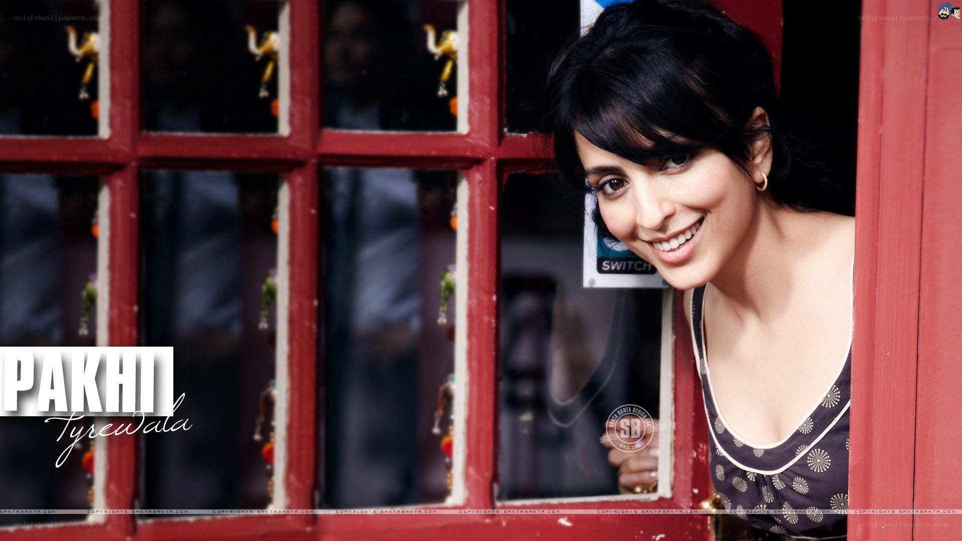 Pakhi Tyrewala smiling at window