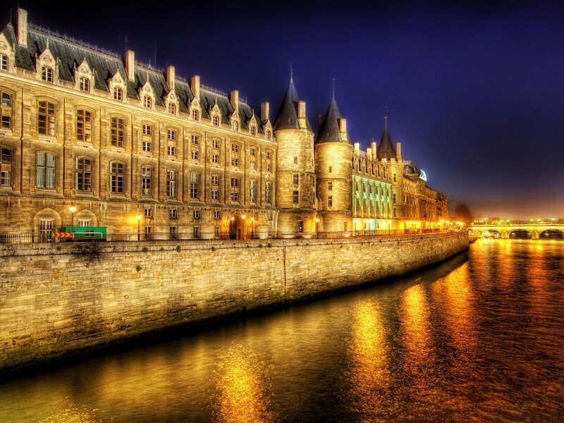 Palace Along River at Night