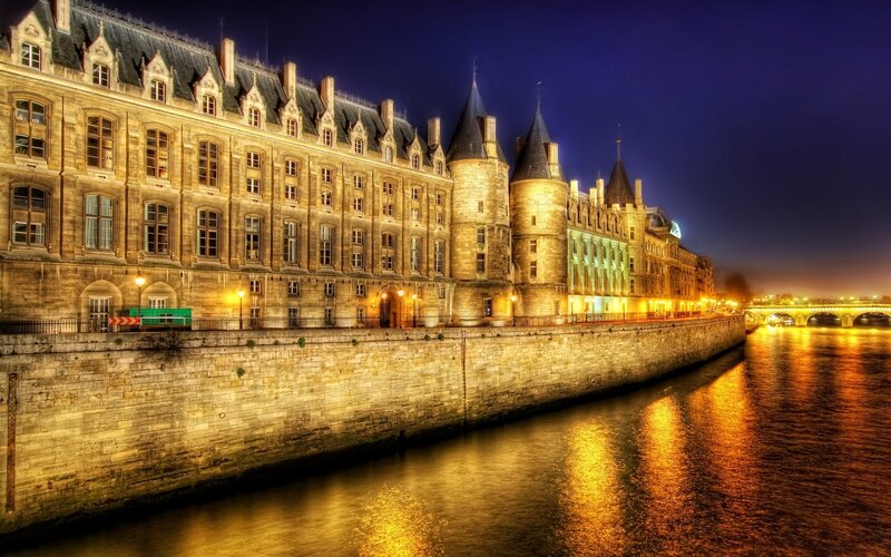 Palace by the river at night