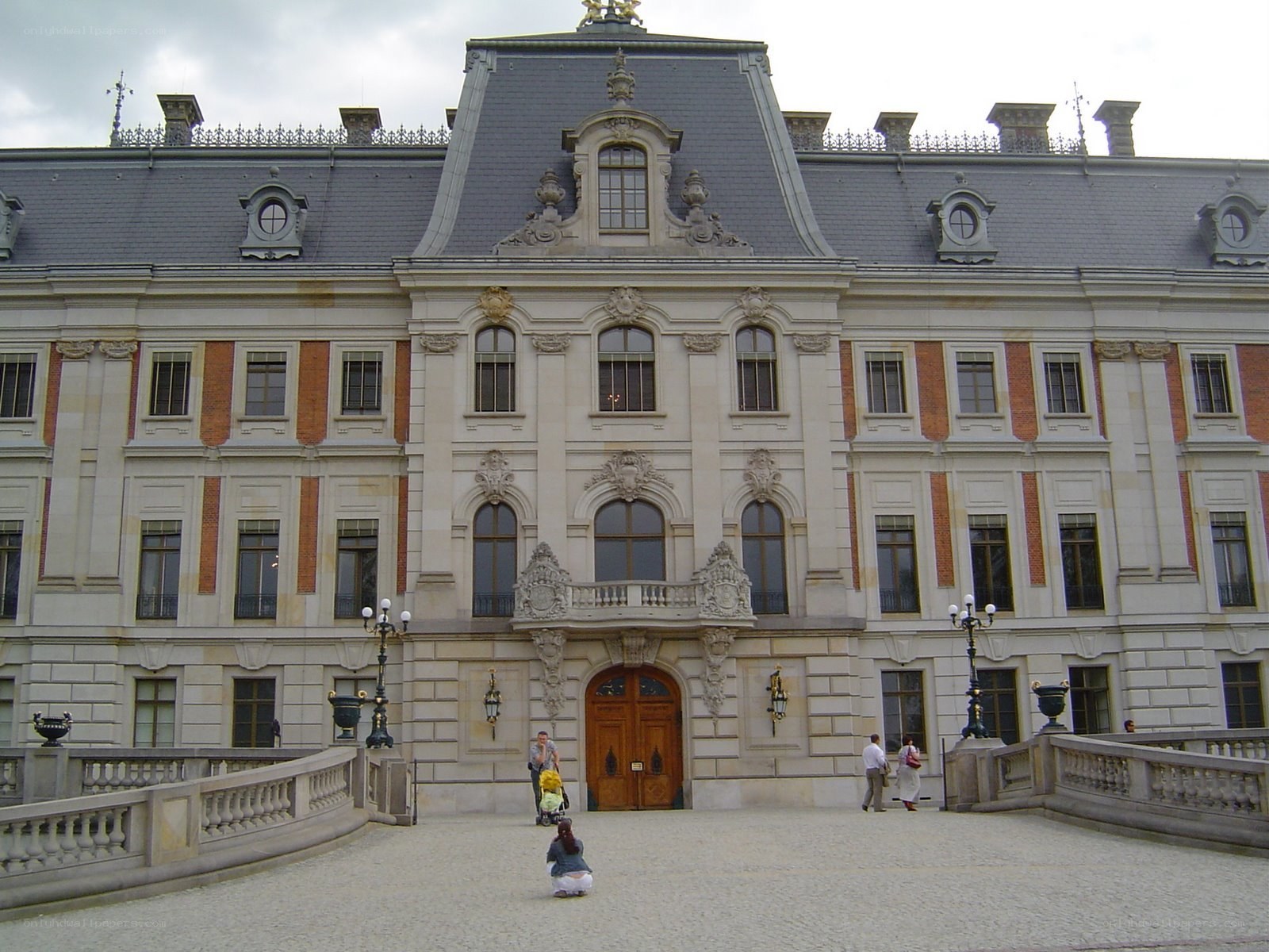palace facade with visitors