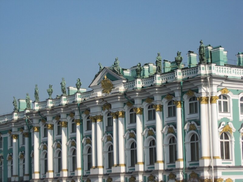 palace with statues and columns