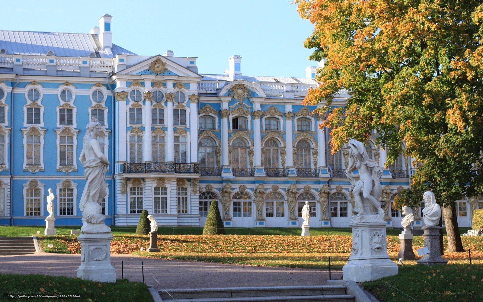 Palace with statues in autumn