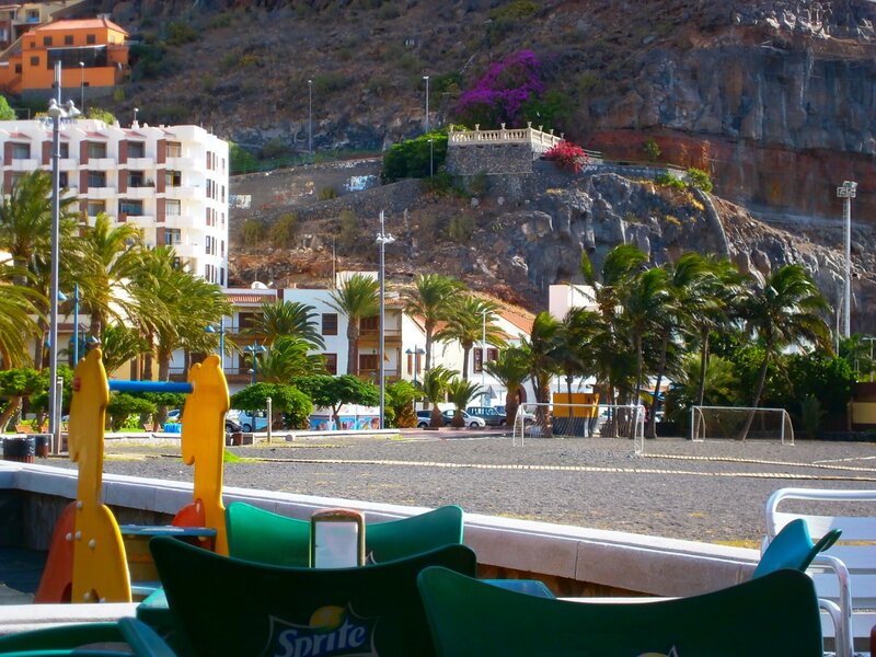 Palm trees and resort buildings
