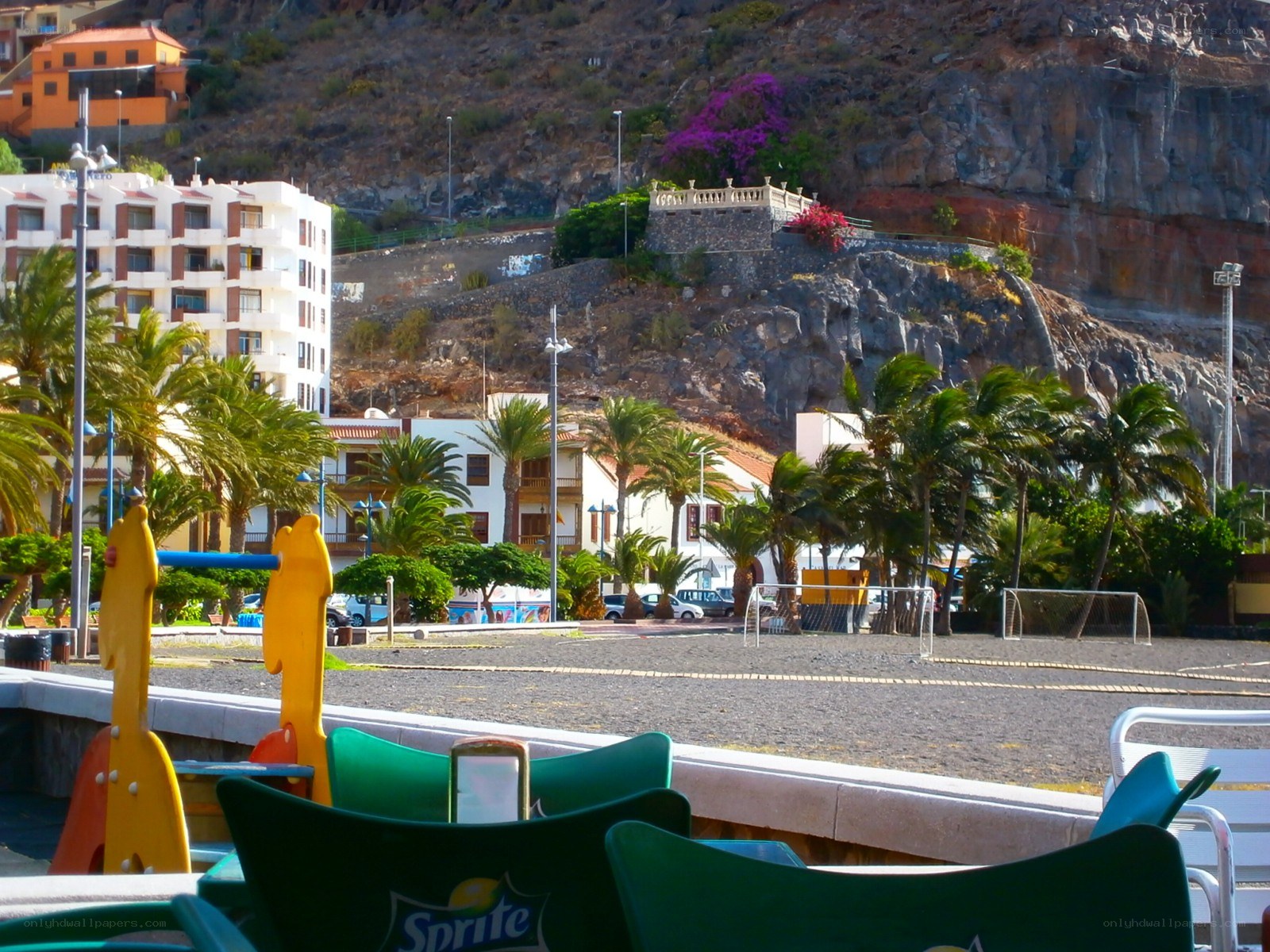 Palm trees and resort buildings