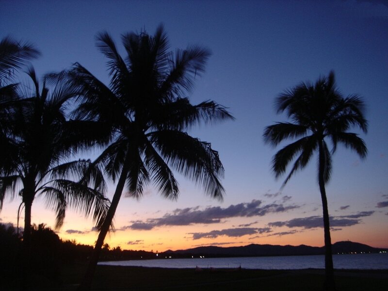 Palm Trees at Sunset — Blue, Serene, Photograph, Sky, Water, Mountains