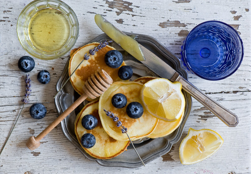 Pancakes with blueberries and honey