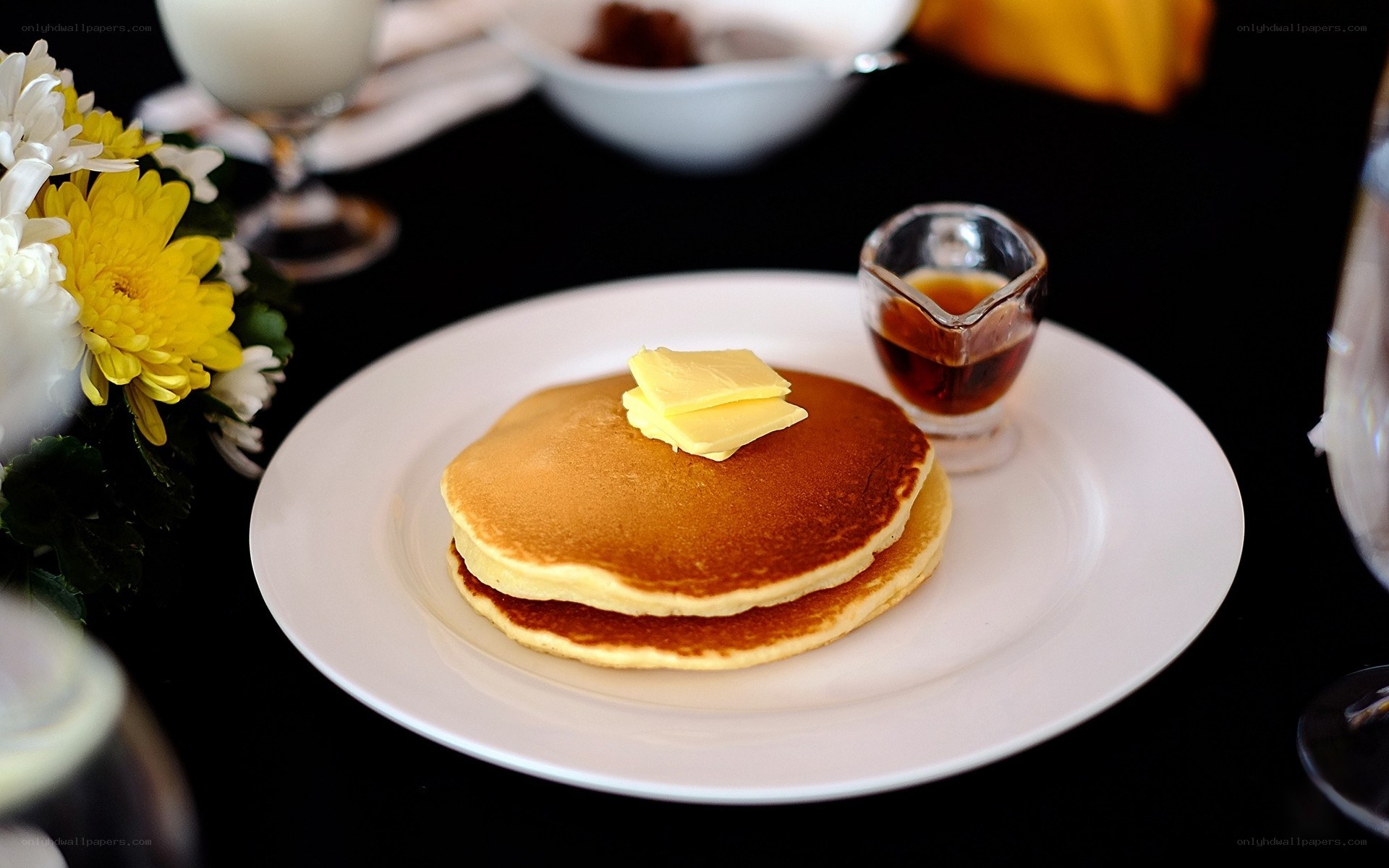 Pancakes with butter and syrup