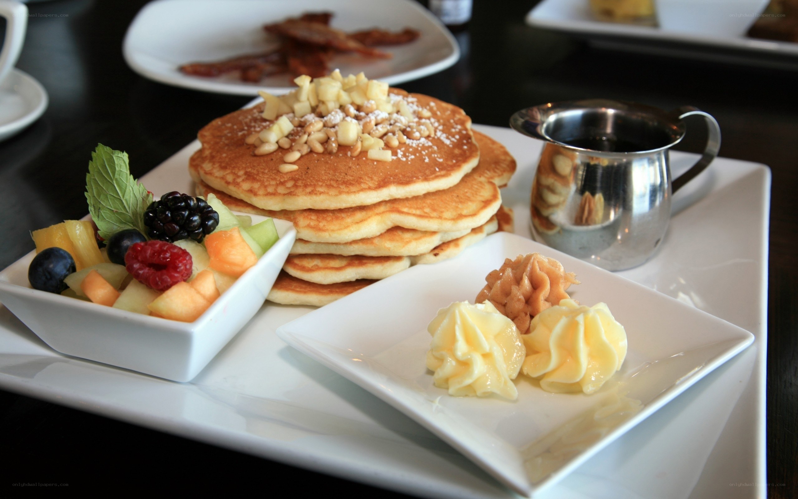 Pancakes with fruit and bacon