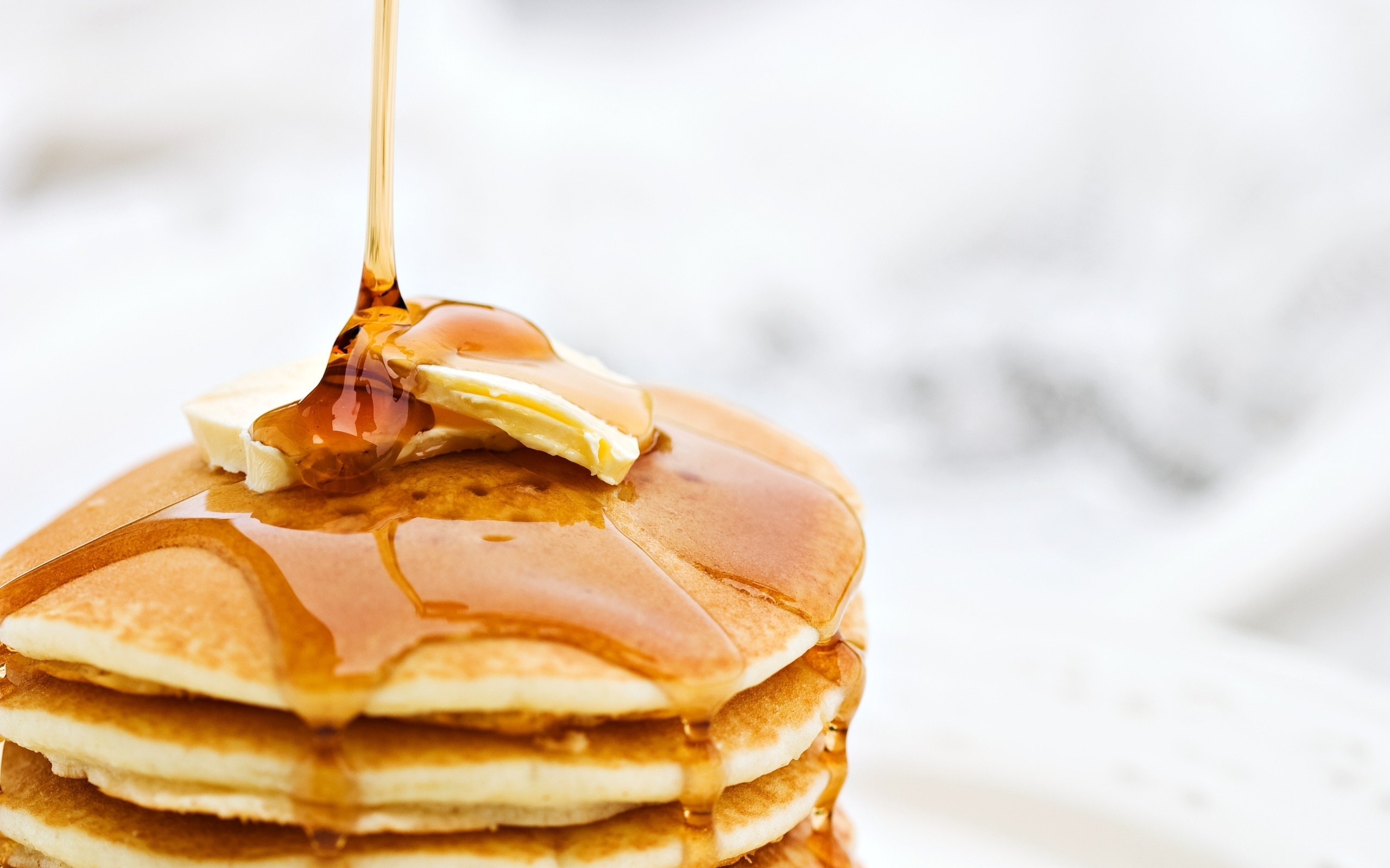 Pancakes with syrup and butter