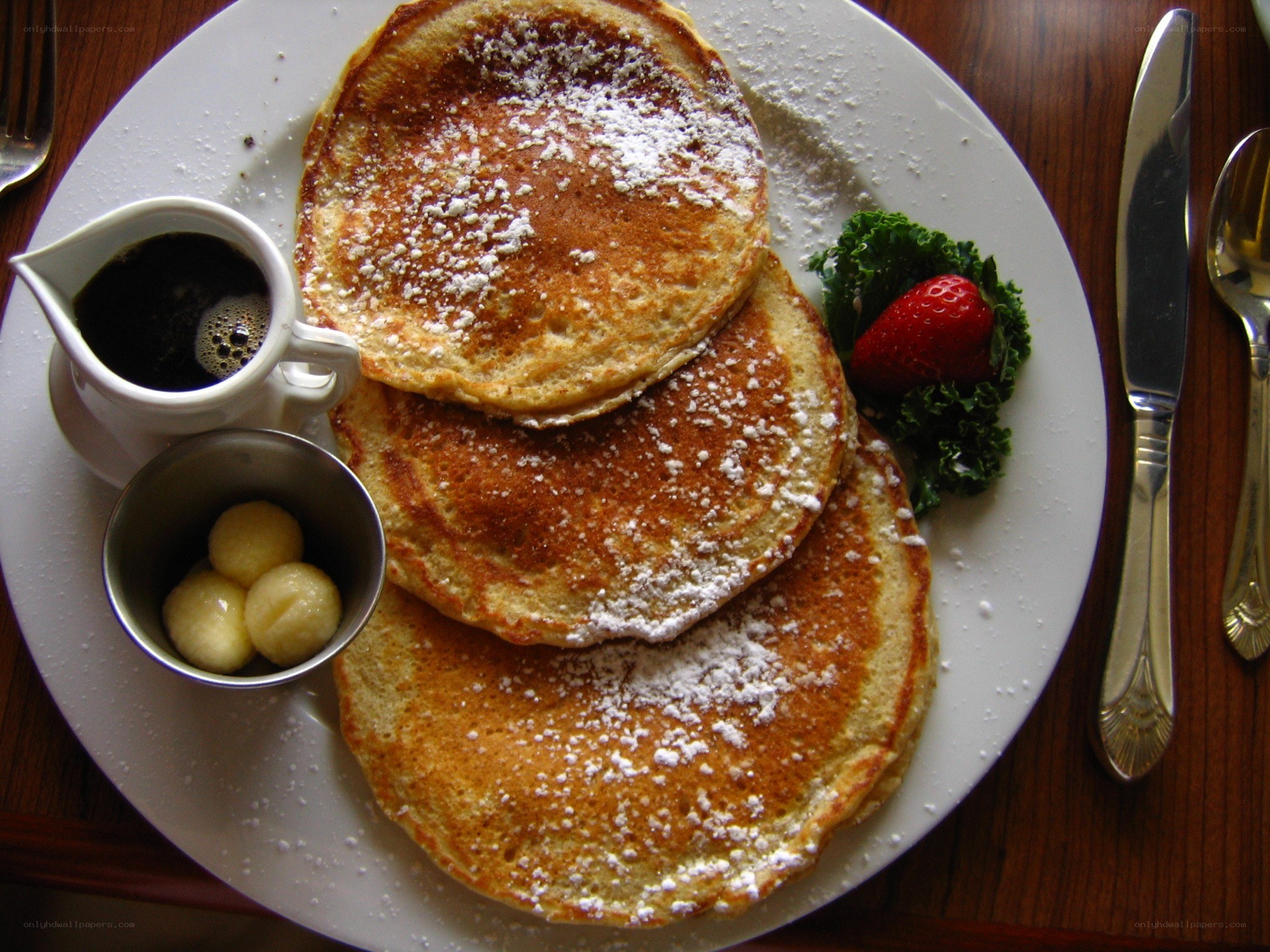 Pancakes with syrup and fruit
