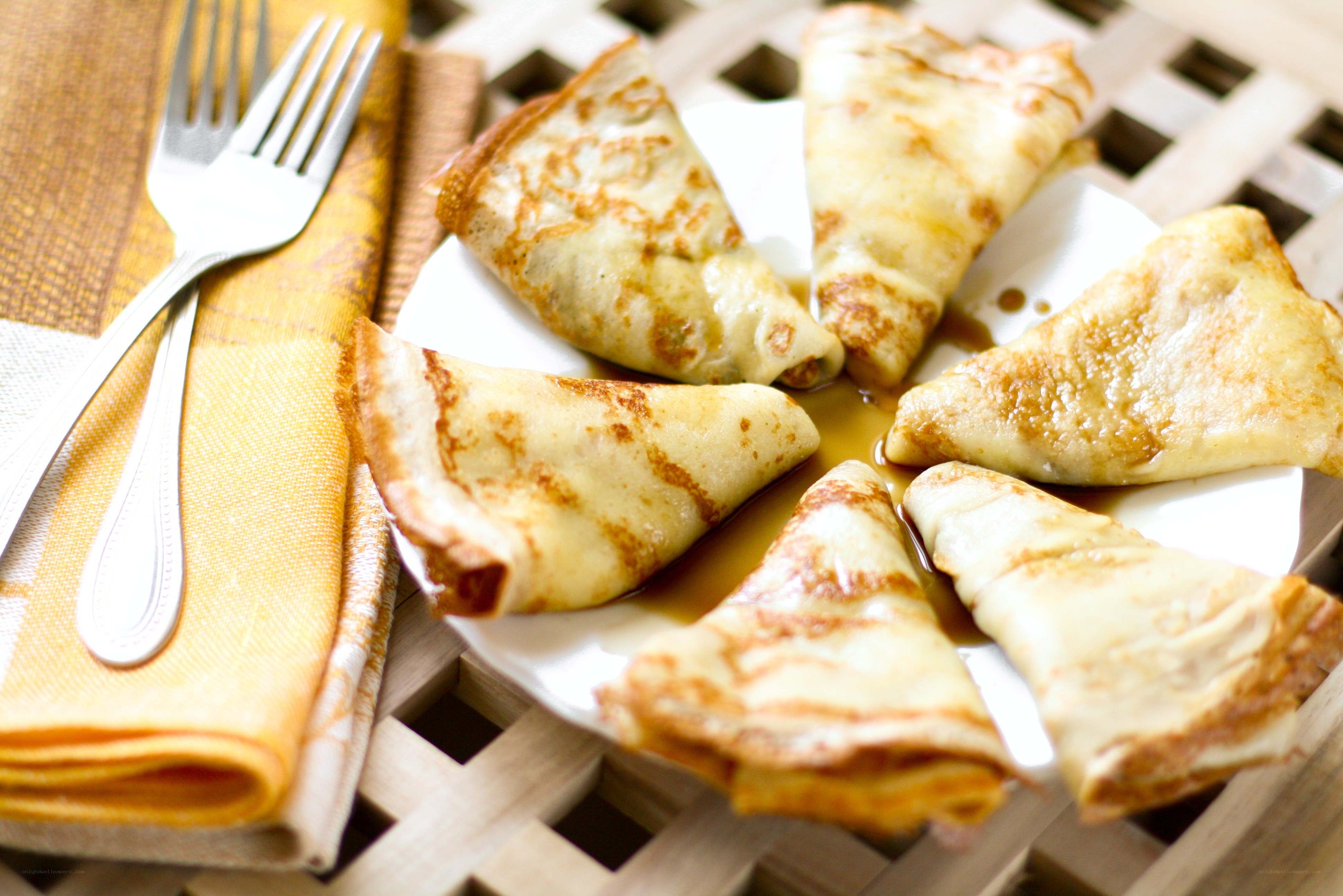 Pancakes with syrup on a plate