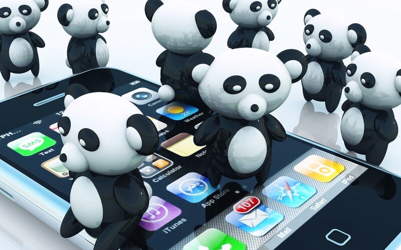Panda figurines on smartphone