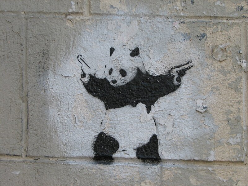 Panda with guns graffiti