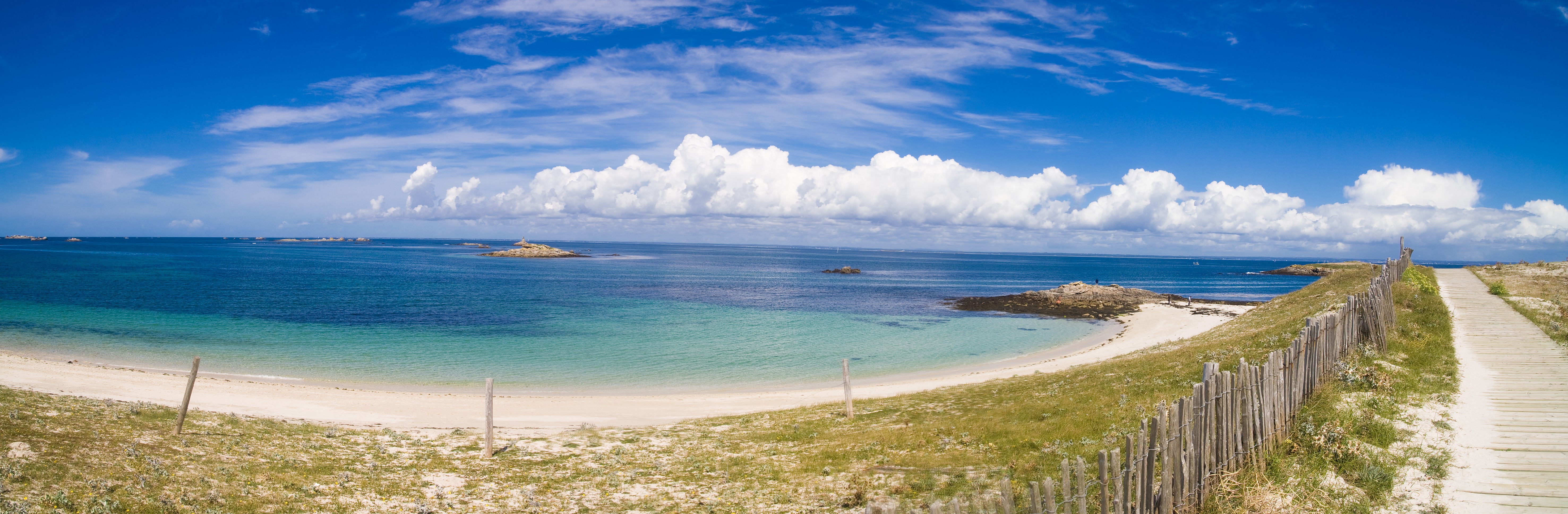 Panoramic beach with blue sky