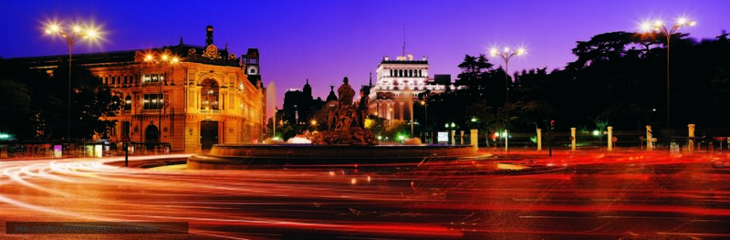 Panoramic city square at dusk