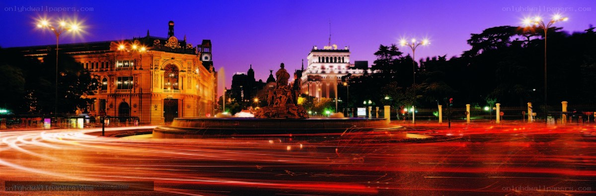 Panoramic city square at dusk