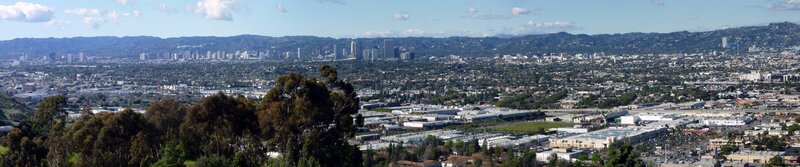 Panoramic City View — Green, Serene, Afternoon