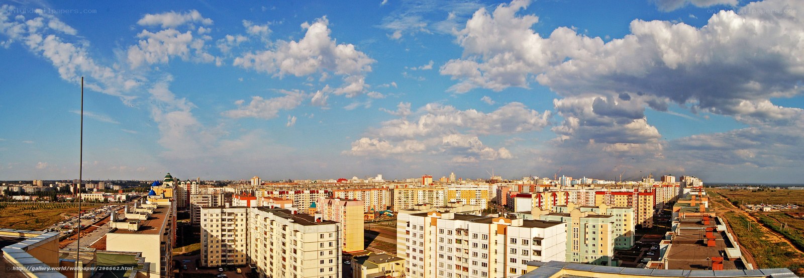Panoramic city view with clouds