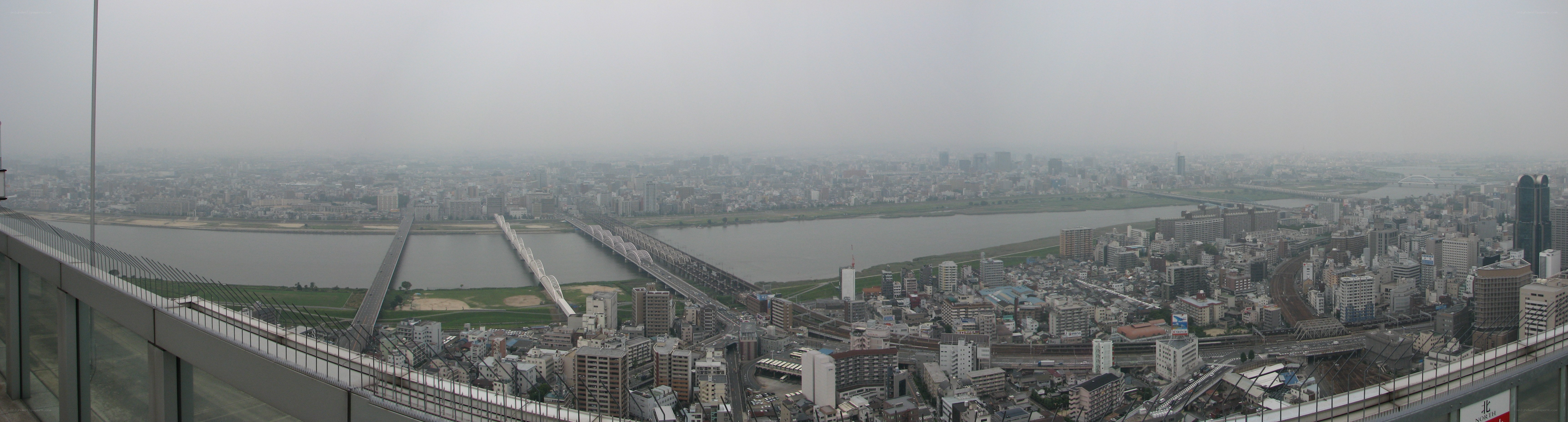Panoramic city view with river