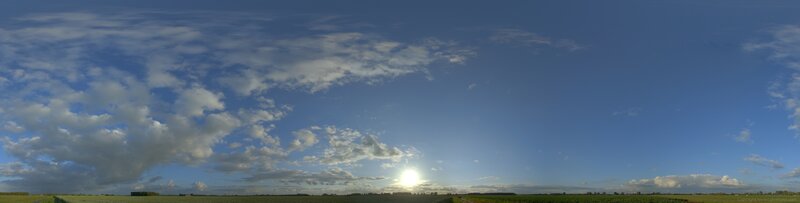 Panoramic sky over fields