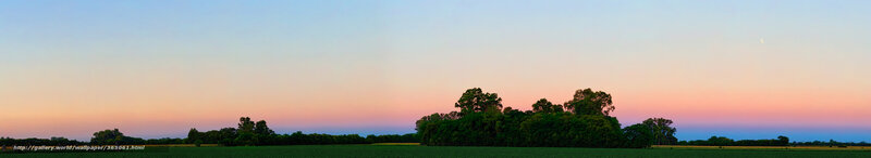 Panoramic sunset over farmland