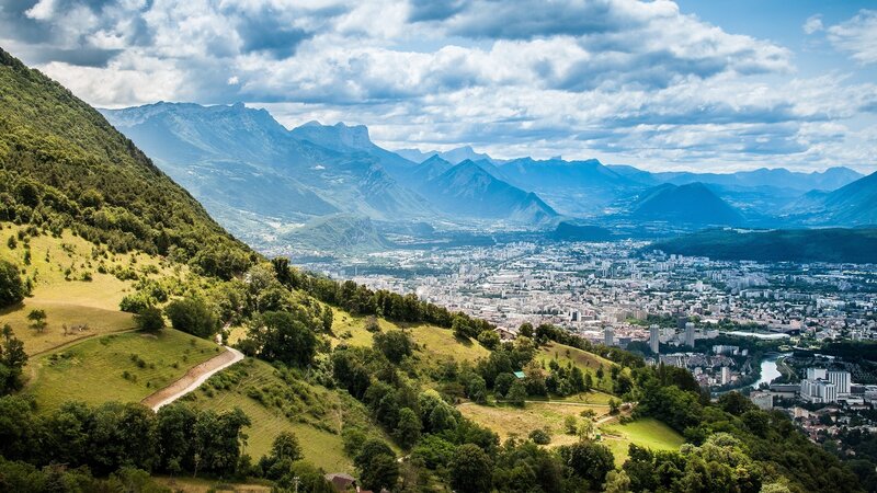 panoramic view of a city in the mountains