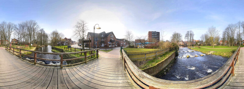 Panoramic view of a river and town