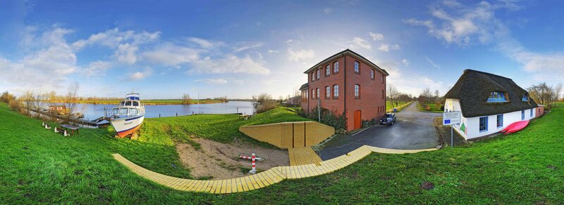 Panoramic view of a riverside village