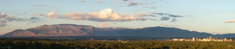 Panoramic view of mountains and city