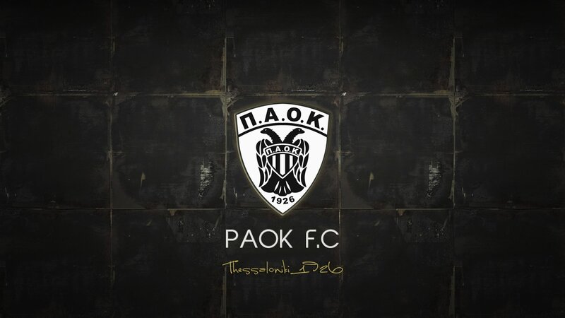 PAOK FC logo on dark wall