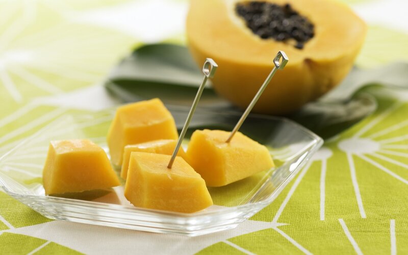 Papaya fruit cubes on a plate