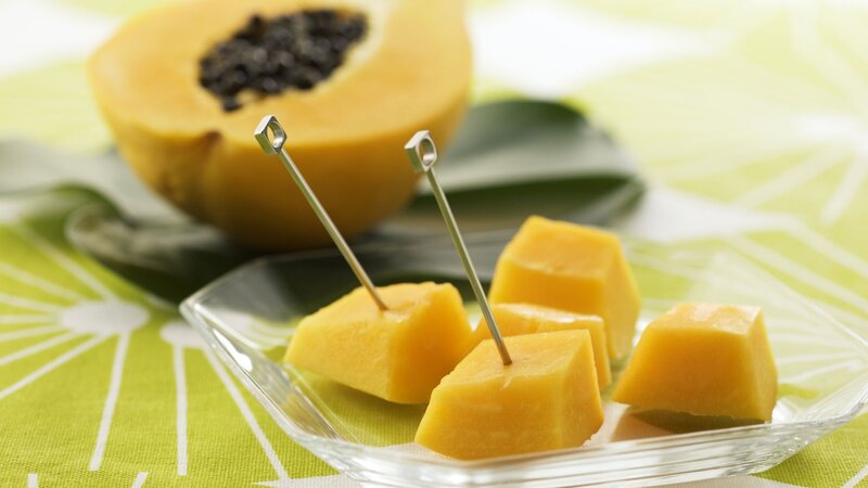 Papaya fruit cubes on plate