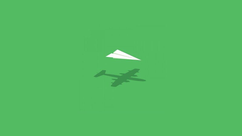 Paper airplane and shadow