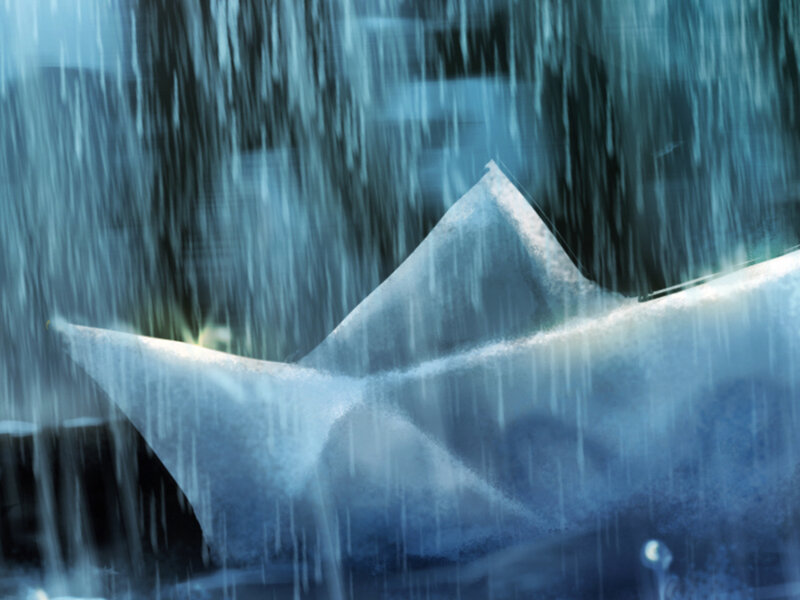 paper boat in rainstorm